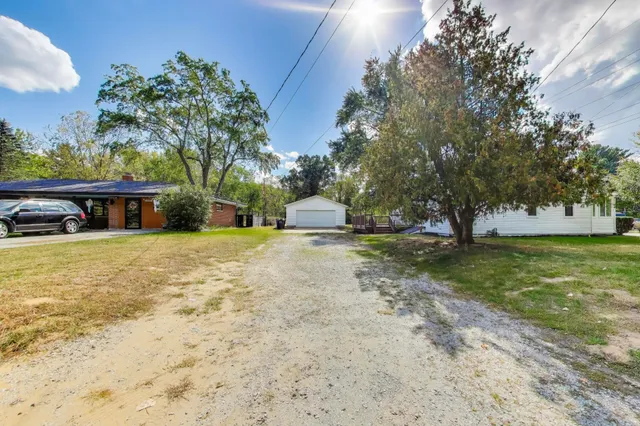 a view of an outdoor space and a yard