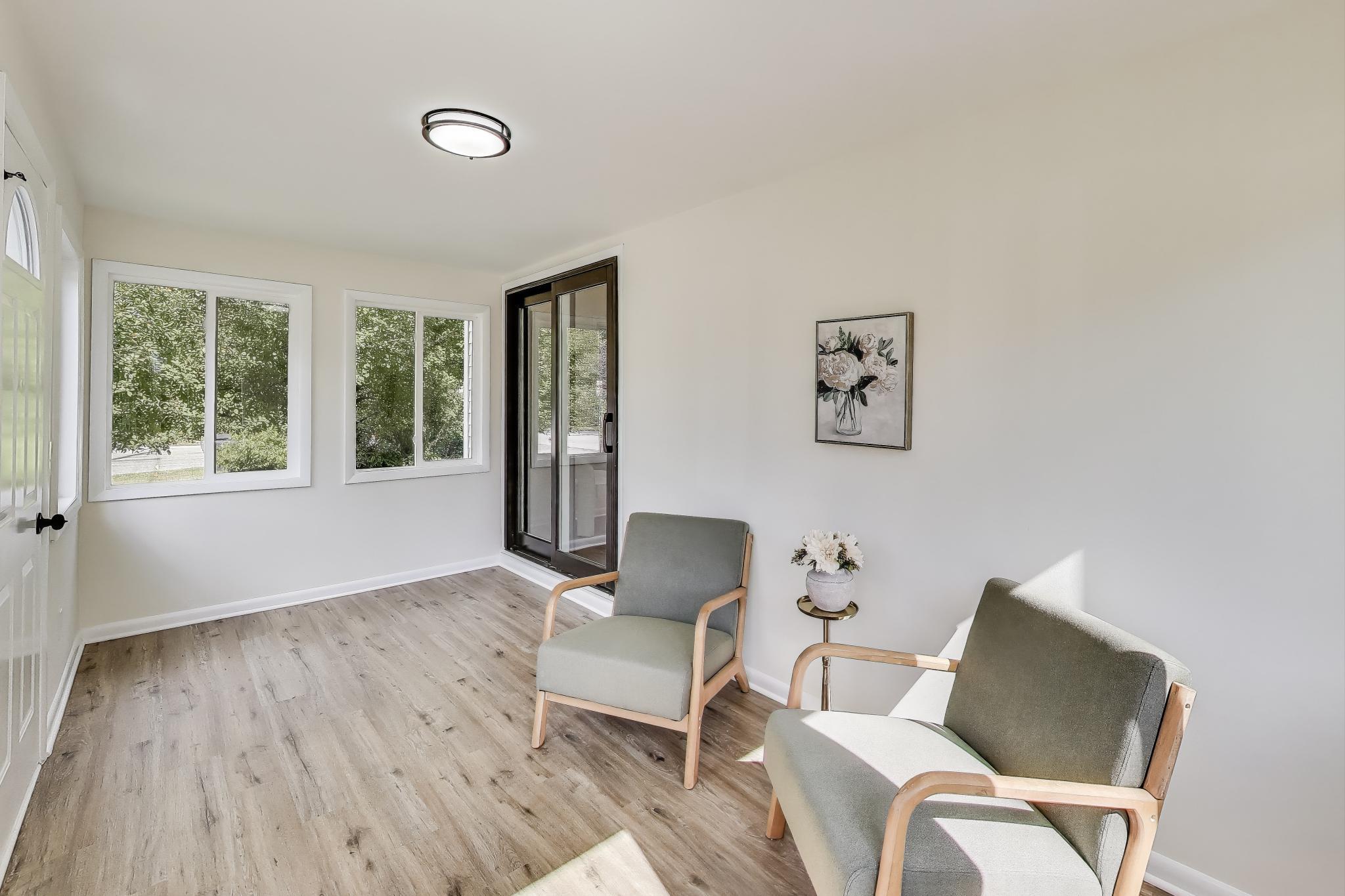 102 South Karwick Road Michigan City, IN 46360 - Photo 3 of 30 a living room with furniture and a window