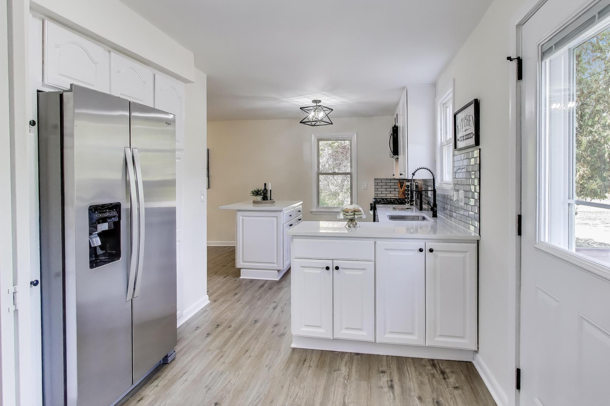 102 South Karwick Road Michigan City, IN 46360 - Photo 9 of 30 a bathroom with a sink and a mirror