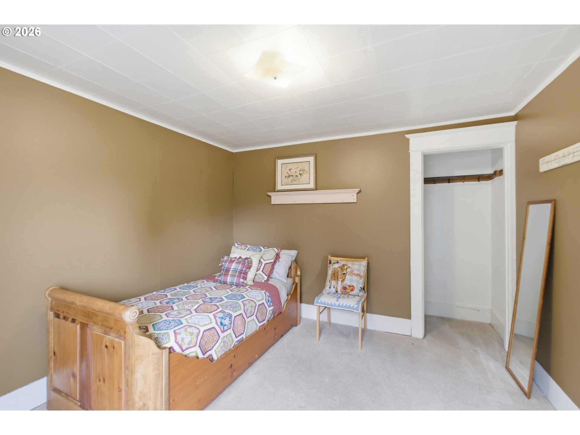 2862 Matheny Road Northeast Gervais, OR 97026 - Photo 21 of 47 a bedroom with a bed and a television