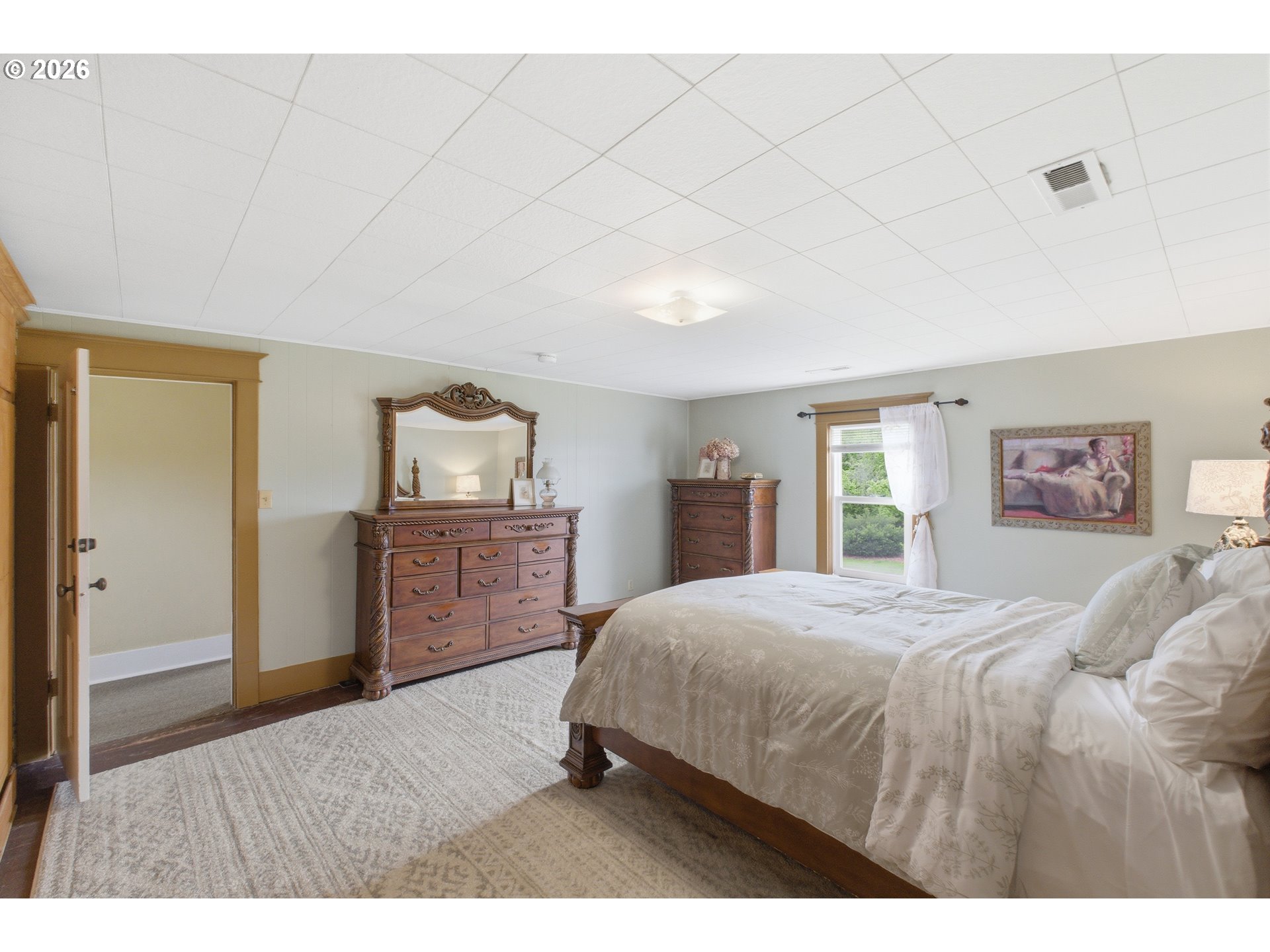 2862 Matheny Road Northeast Gervais, OR 97026 - Photo 26 of 47 a bedroom with a bed and a view of kitchen