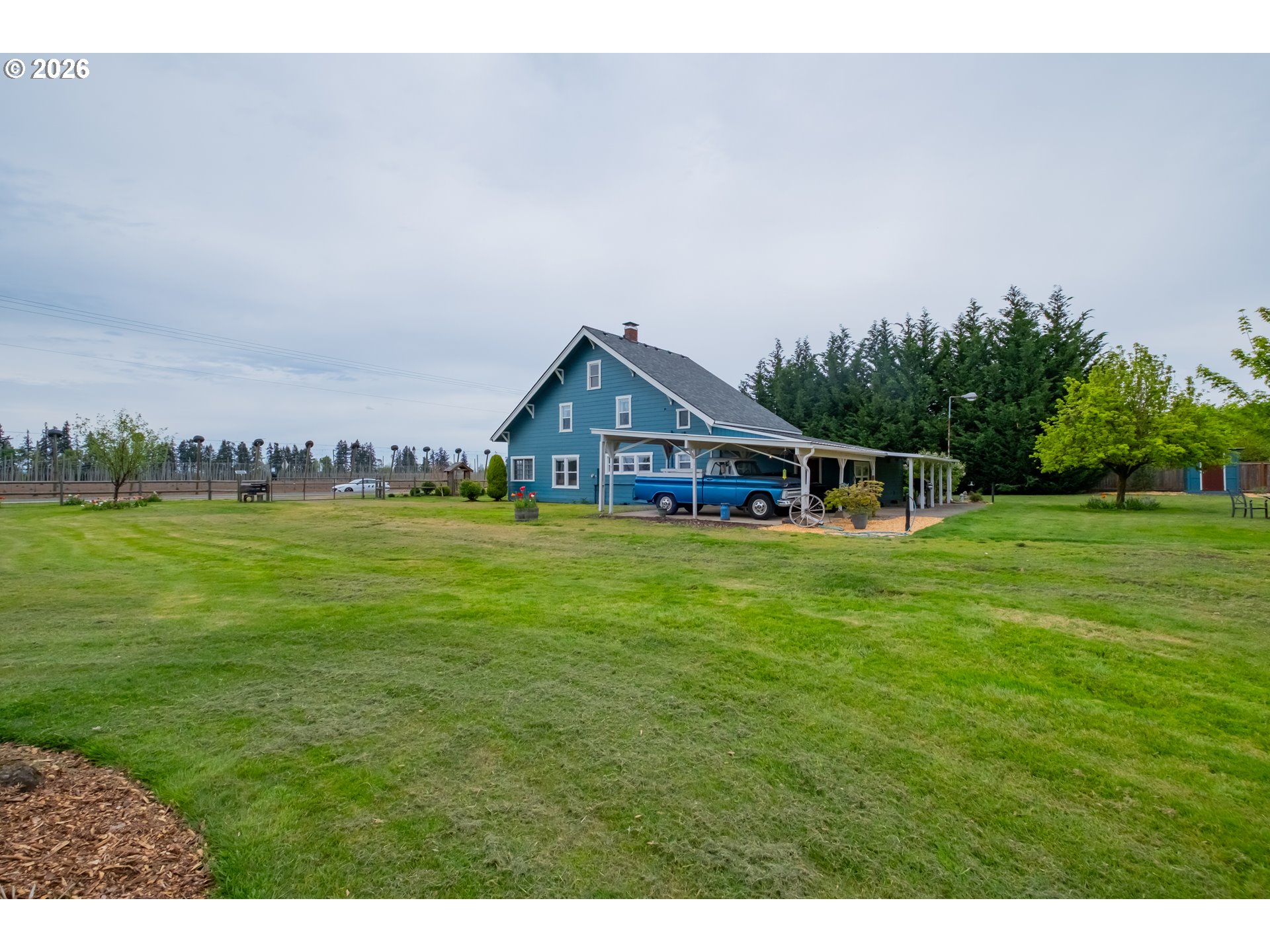 2862 Matheny Road Northeast Gervais, OR 97026 - Photo 37 of 47 a front view of a house with yard and green space
