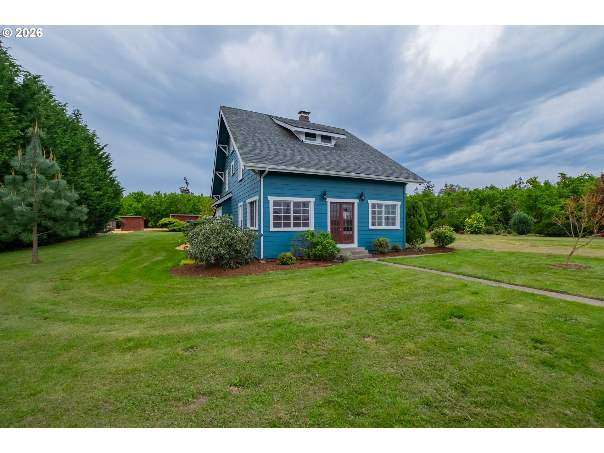 2862 Matheny Road Northeast Gervais, OR 97026 - Photo 40 of 47 a front view of a house with a yard