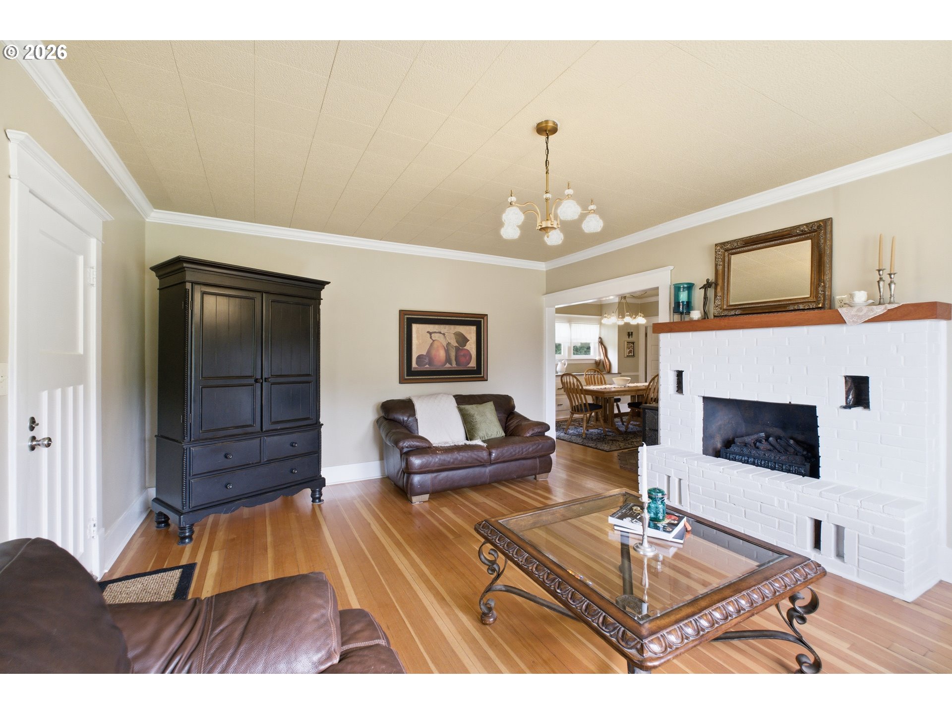 2862 Matheny Road Northeast Gervais, OR 97026 - Photo 8 of 47 a living room with furniture and a fireplace