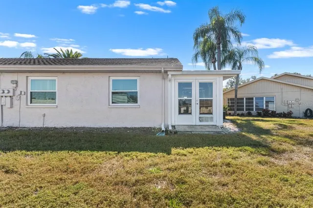 a front view of a house with swimming pool
