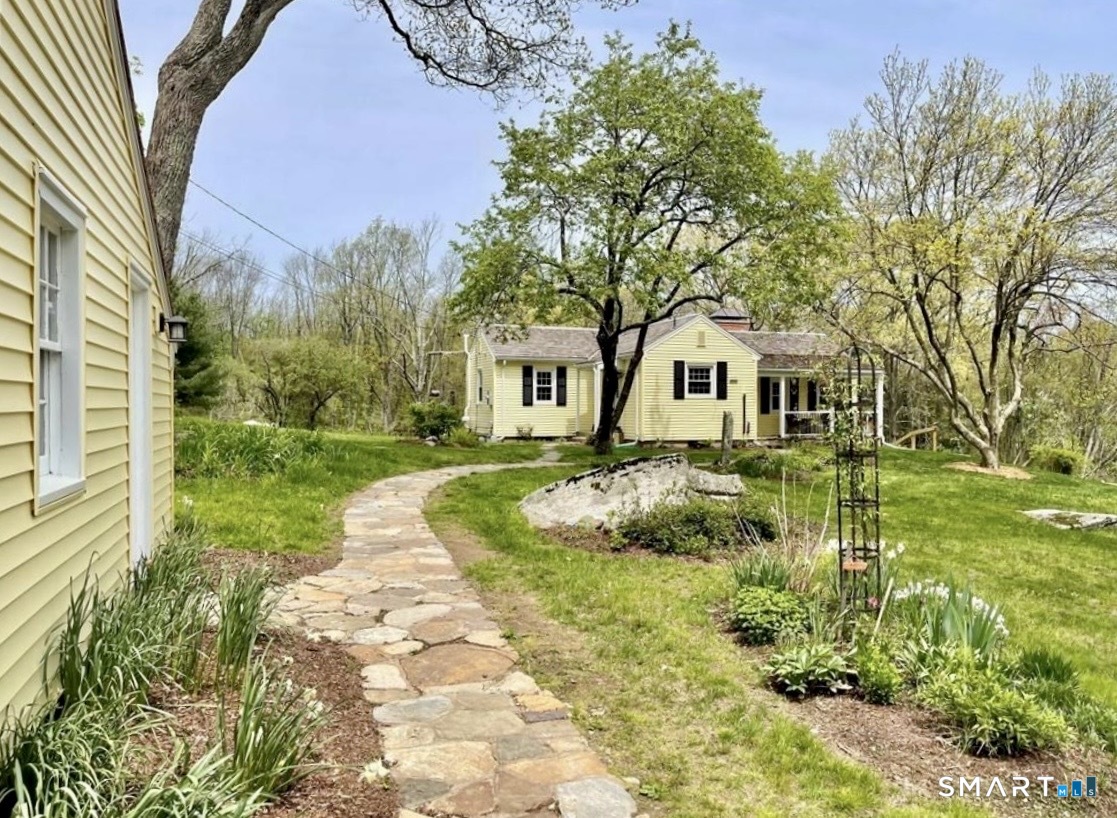 612 Broad Way Coventry, CT 06238 - Photo 1 of 1 a front view of a house with a yard