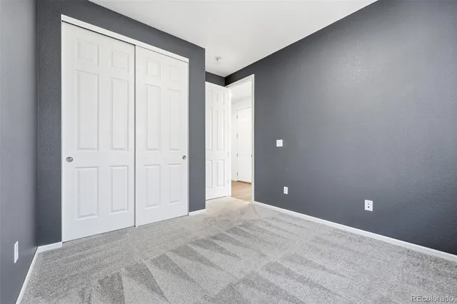 a view of a room with a bathroom