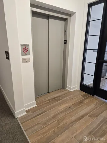 a view of a brick house with a yard