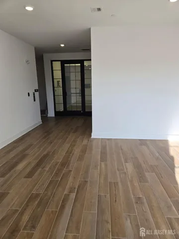 a bathroom with a double vanity sink and mirror