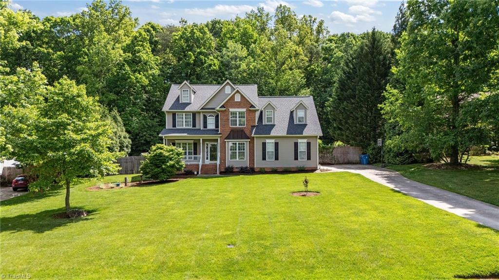 7812 Wilson Farm Road Summerfield, NC 27358 - Photo 1 of 50 Well maintained lush yard, county taxes, NW district