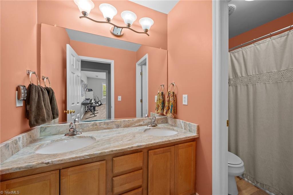 7812 Wilson Farm Road Summerfield, NC 27358 - Photo 42 of 50 Double vanities in hall bathroom