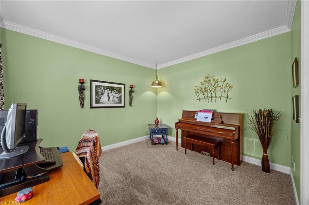 7812 Wilson Farm Road Summerfield, NC 27358 - Photo 7 of 50 Living room could be used as home office or playroom