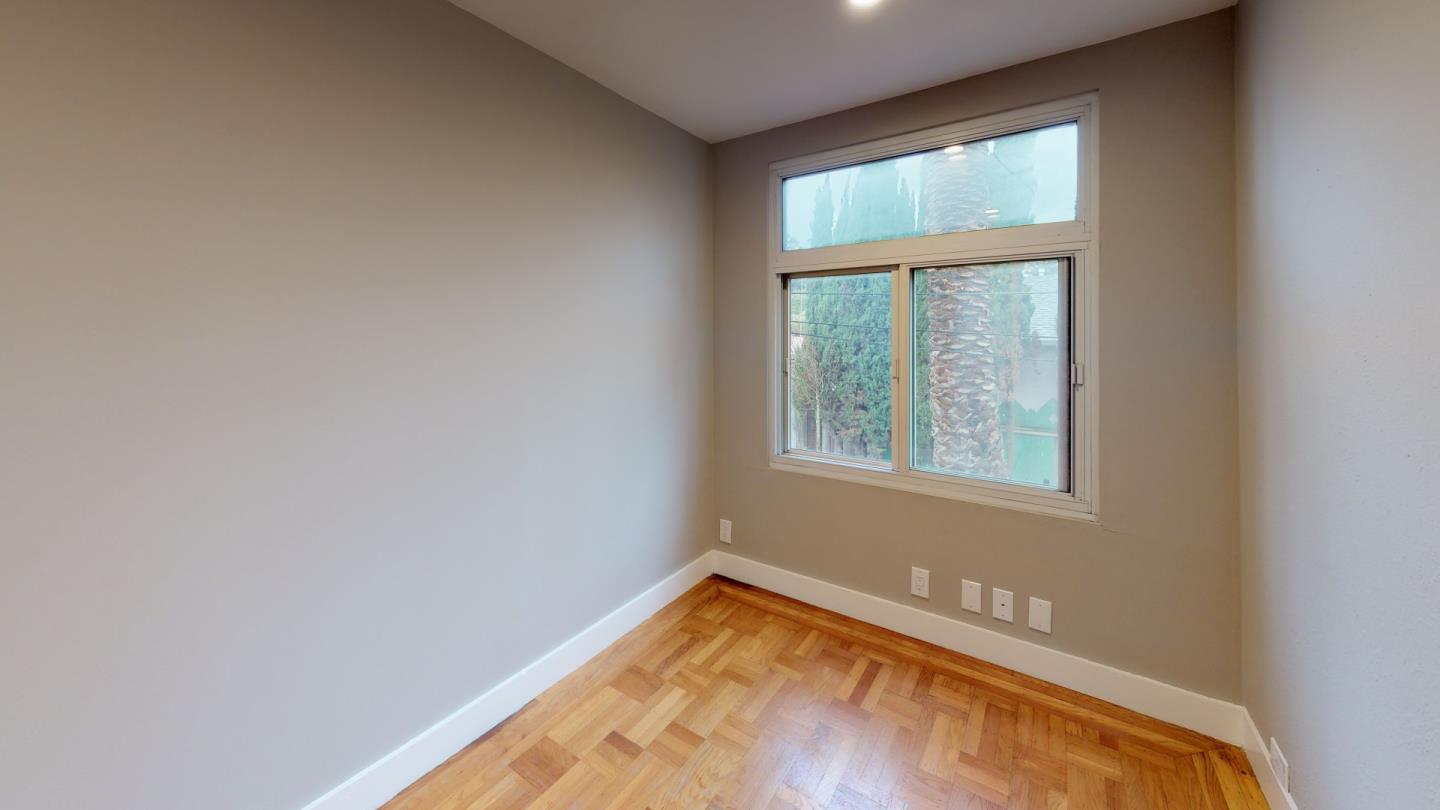 320 Cedar Street Millbrae, CA 94030 - Photo 22 of 33 an empty room with a window
