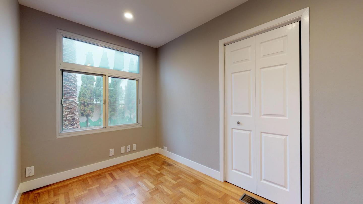 320 Cedar Street Millbrae, CA 94030 - Photo 27 of 33 an empty room with windows