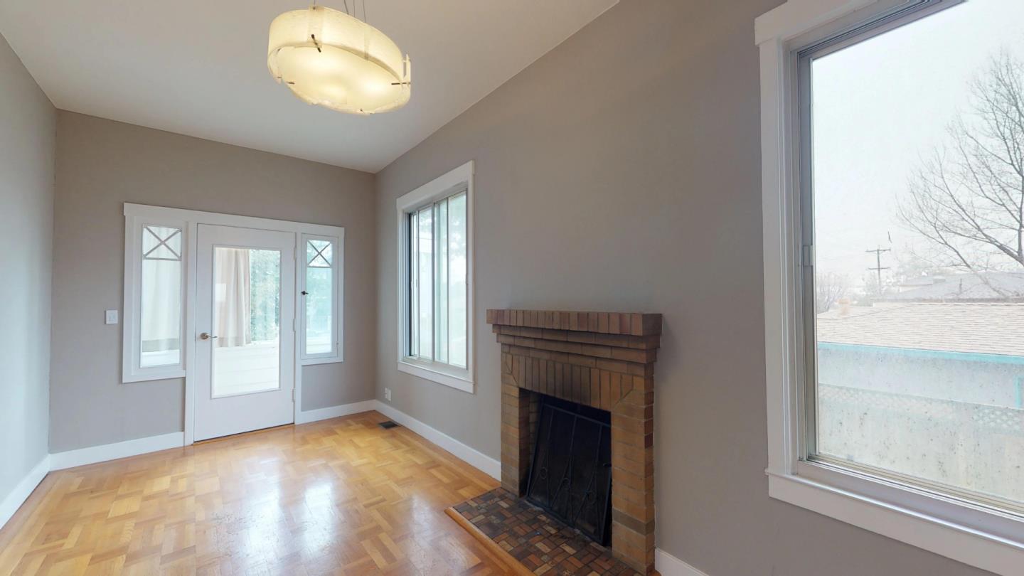 320 Cedar Street Millbrae, CA 94030 - Photo 7 of 33 an empty room with windows