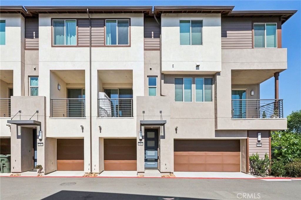 1571 Lima Way, Unit 5 Placentia, CA 92870 - Photo 1 of 21 a front view of residential houses