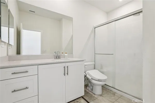 a view of a hallway with washer and dryer