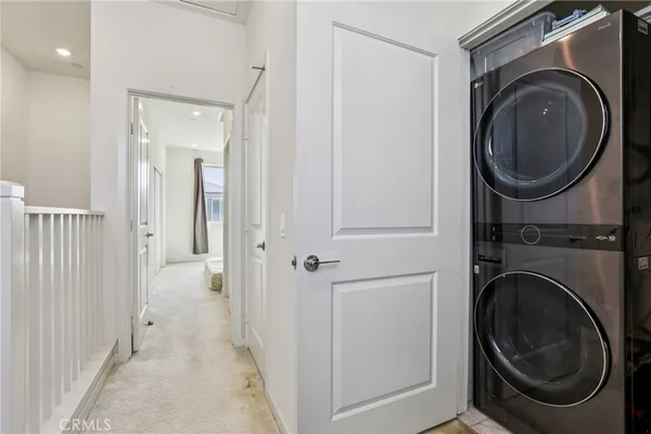 a bathroom with a sink mirror and toilet