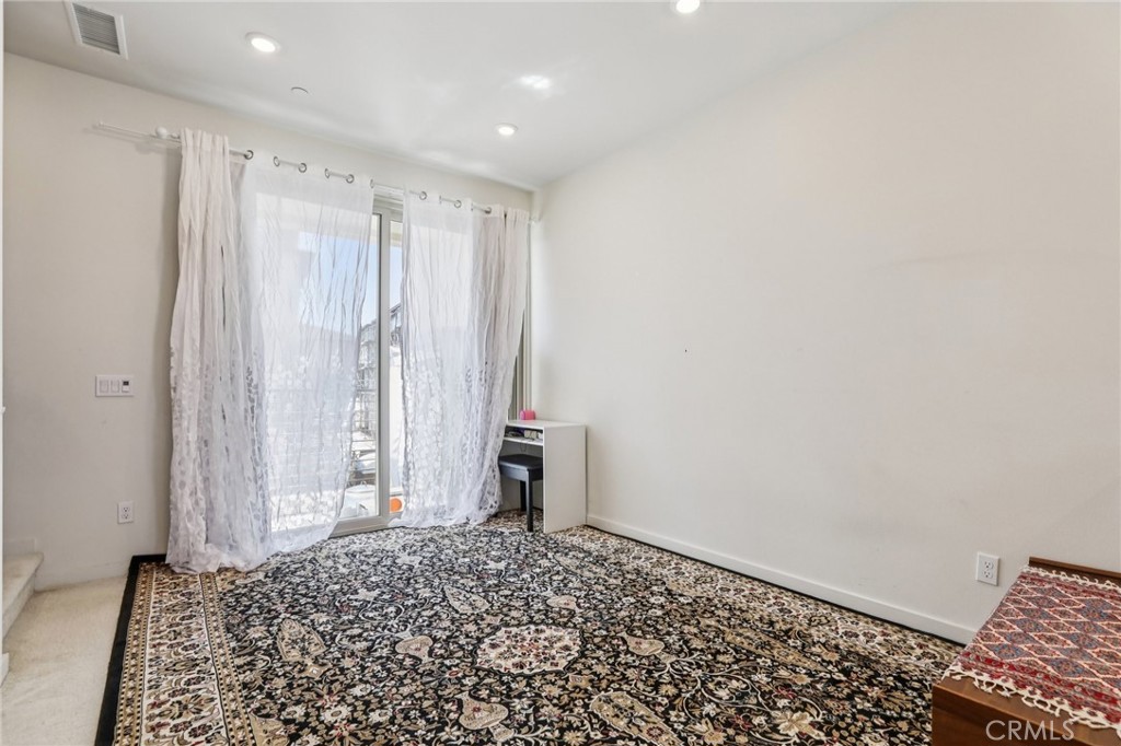 1571 Lima Way, Unit 5 Placentia, CA 92870 - Photo 7 of 21 a view of a room with a bench and a window