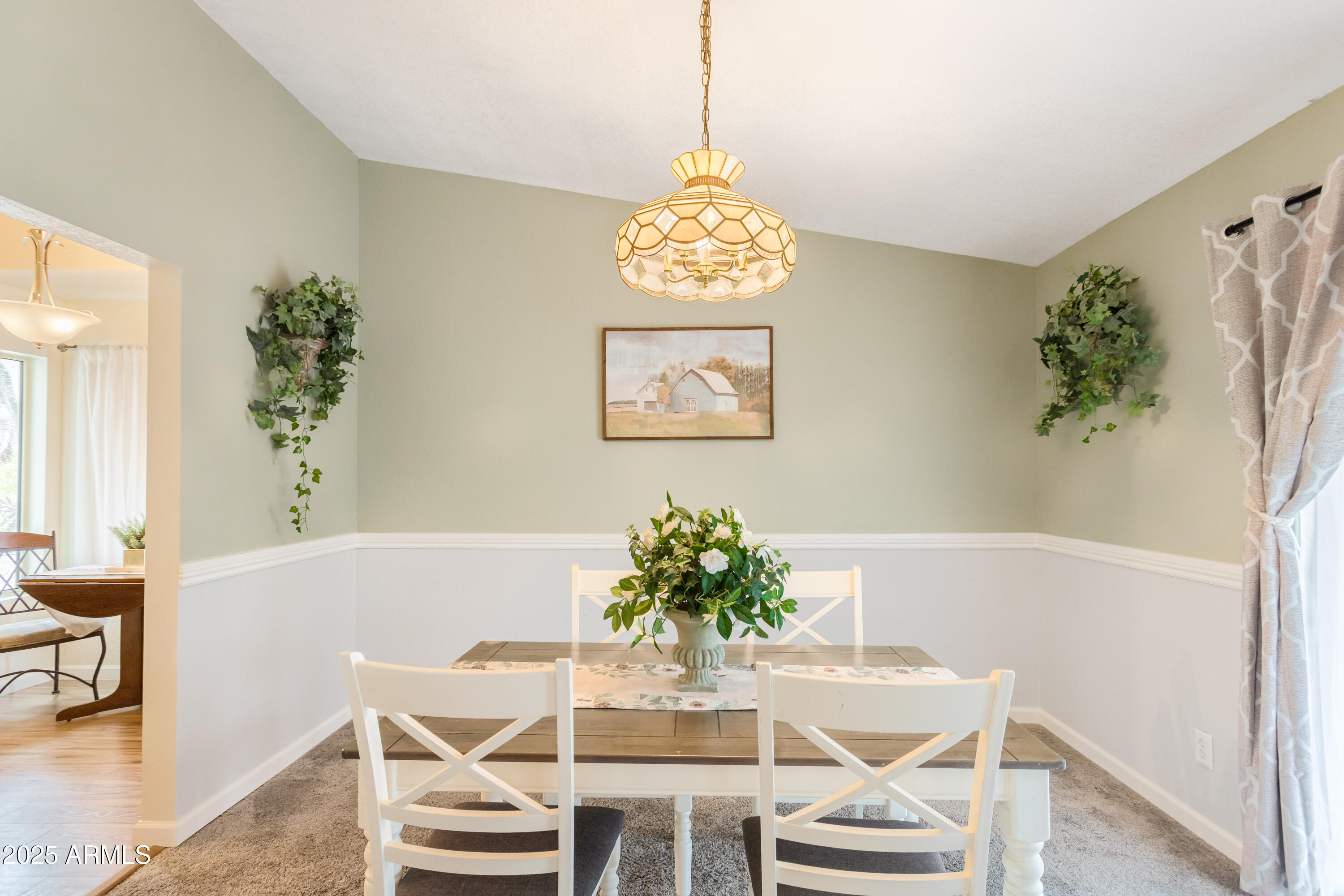 4931 Loma Loop Sierra Vista, AZ 85635 - Photo 12 of 47 a view of a dining room with furniture and wooden floor