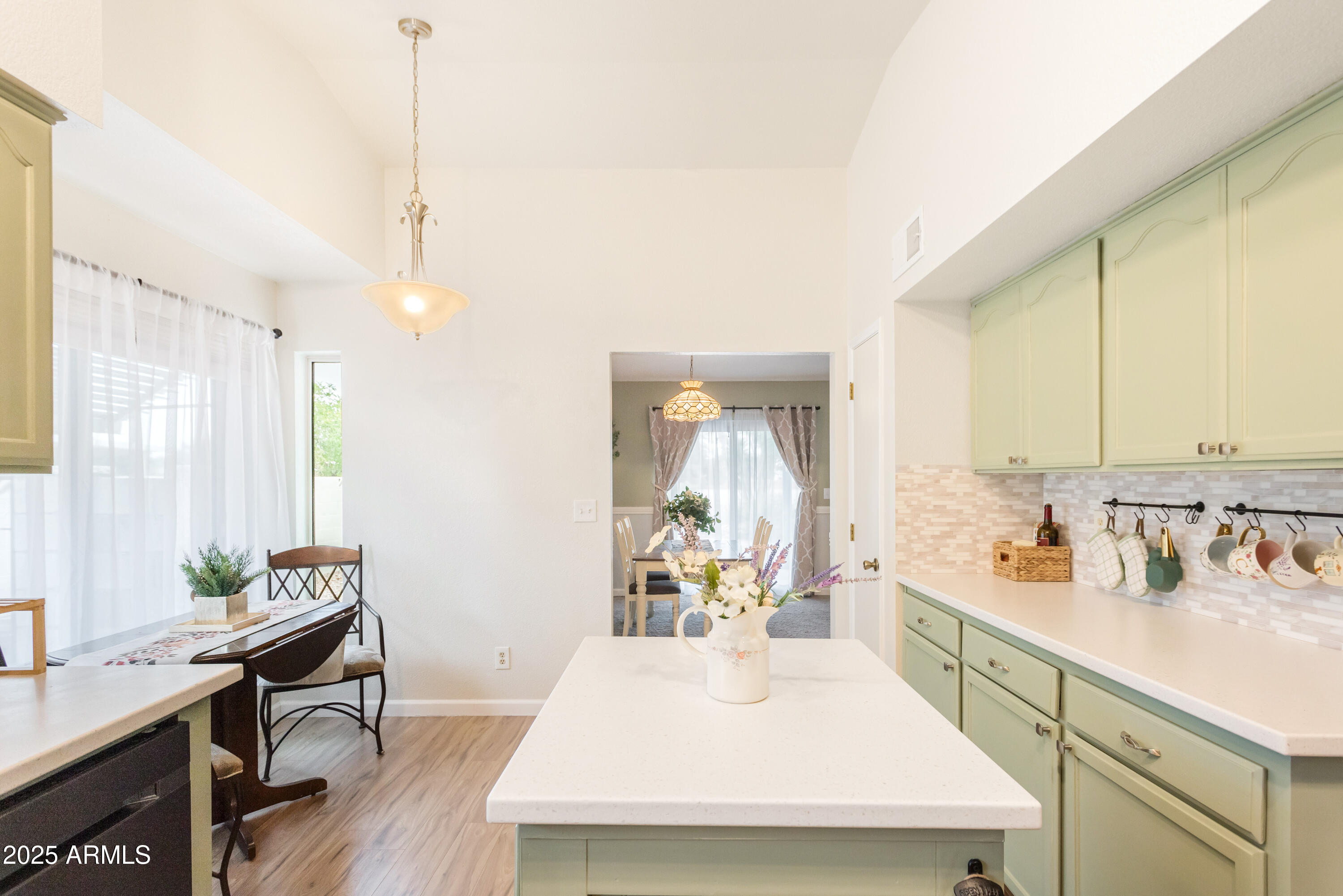 4931 Loma Loop Sierra Vista, AZ 85635 - Photo 16 of 47 a large white kitchen with a large window
