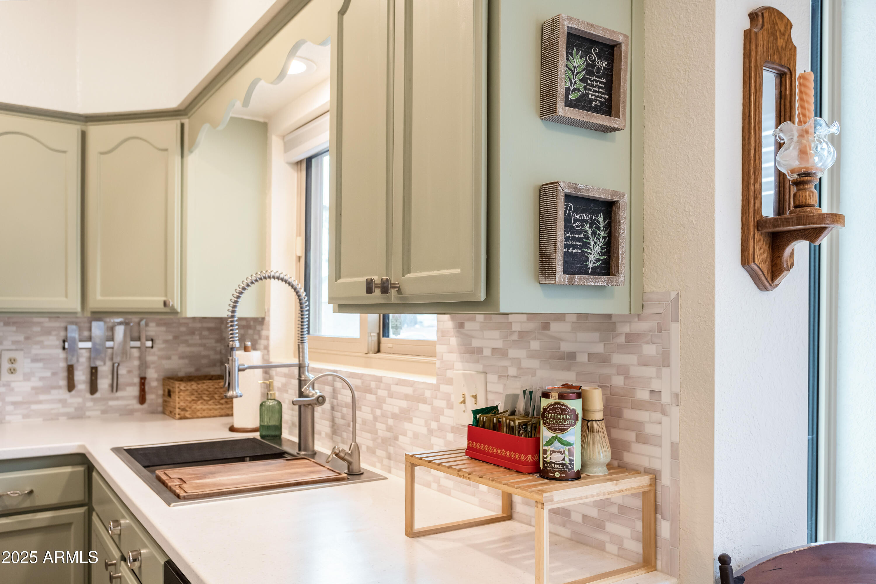 4931 Loma Loop Sierra Vista, AZ 85635 - Photo 17 of 47 a kitchen with a sink cabinets and appliances