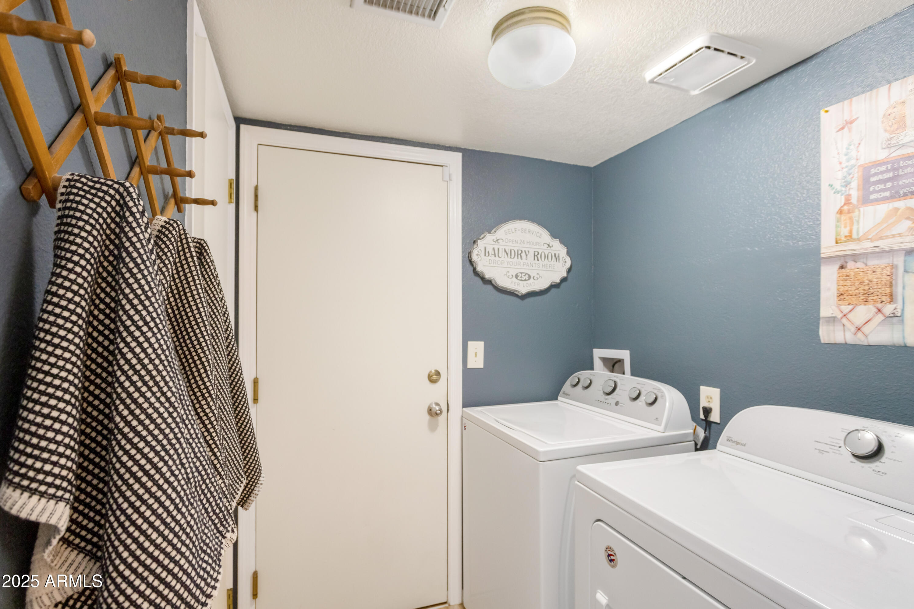 4931 Loma Loop Sierra Vista, AZ 85635 - Photo 23 of 47 a utility room with dryer and washer