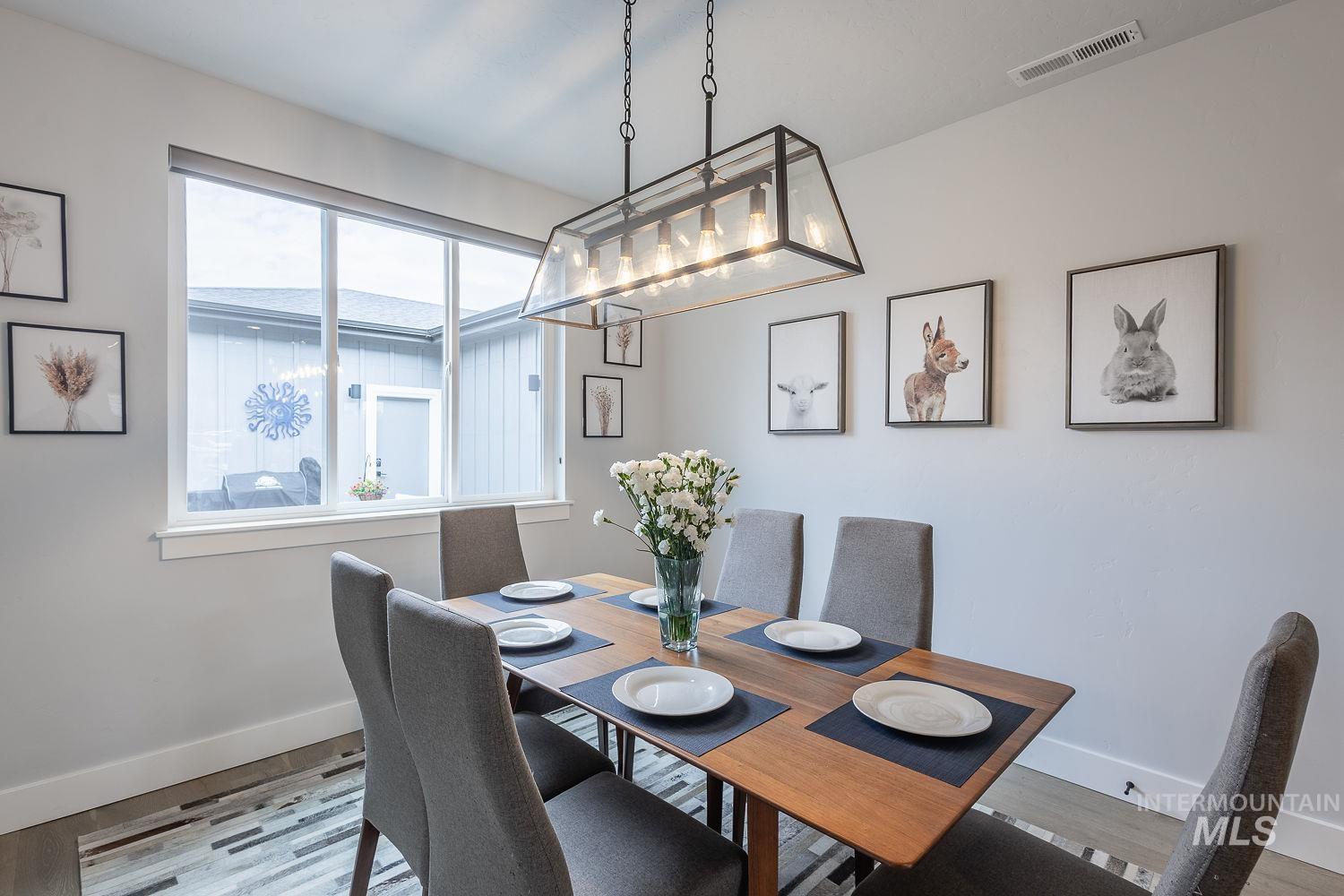 3321 South Hopes Well Way Boise, ID 83716 - Photo 14 of 40 Dining room with wood finished floors