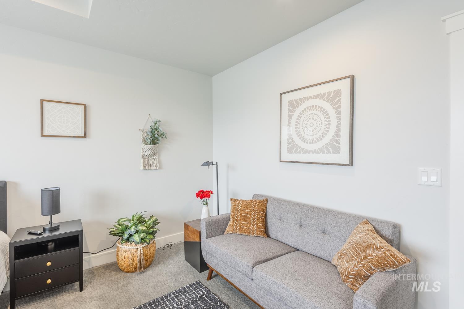3321 South Hopes Well Way Boise, ID 83716 - Photo 29 of 40 Carpeted living area with baseboards