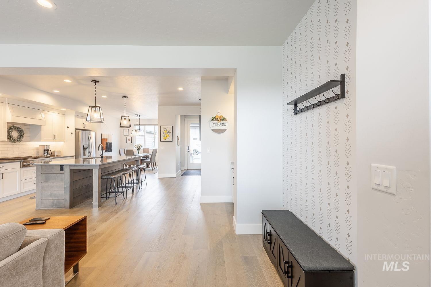 3321 South Hopes Well Way Boise, ID 83716 - Photo 10 of 40 Living area featuring light wood finished floors and recessed lighting