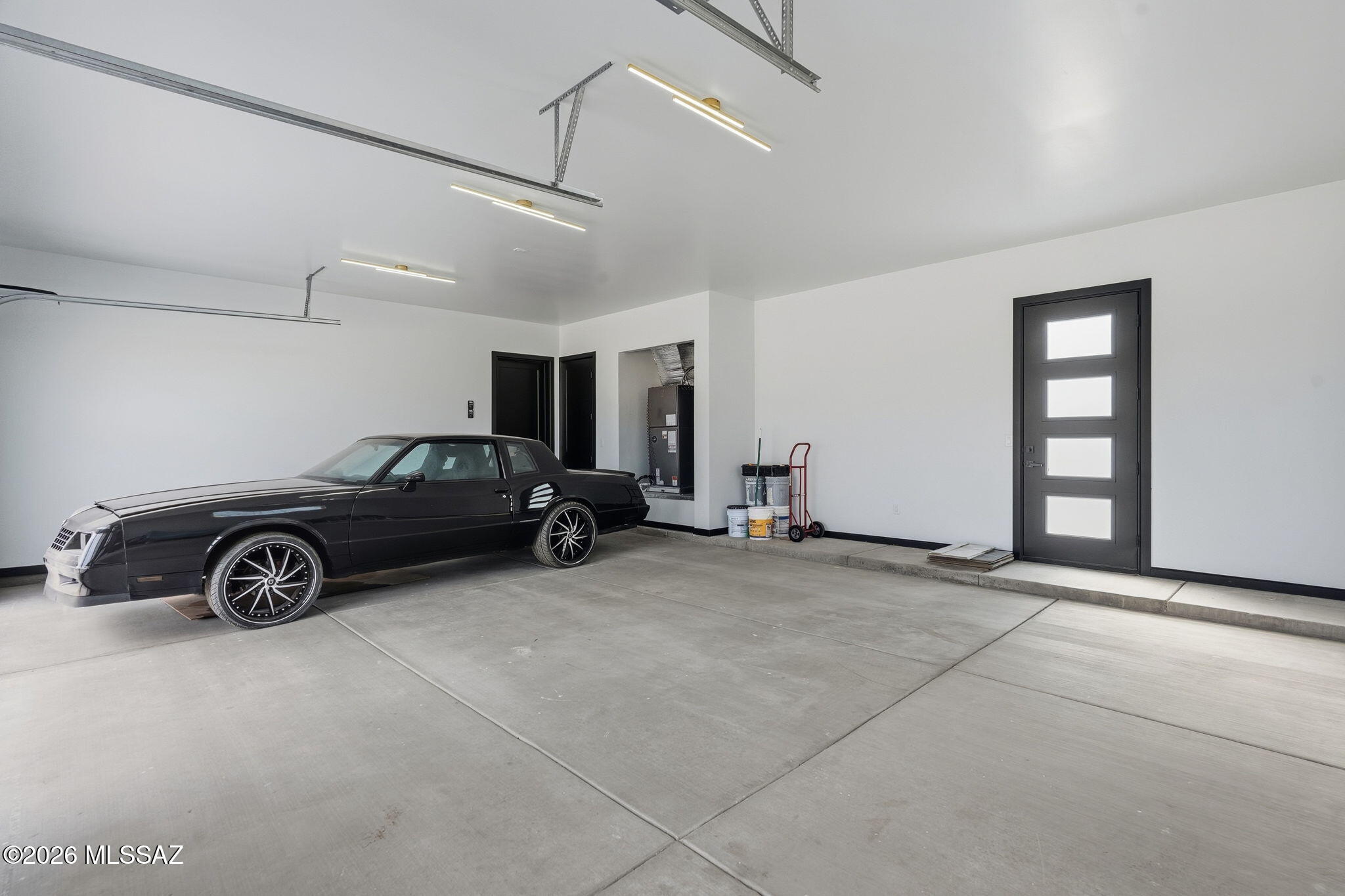 1786 Peralta Court Rio Rico, AZ 85648 - Photo 48 of 50 a car that is parked in a garage