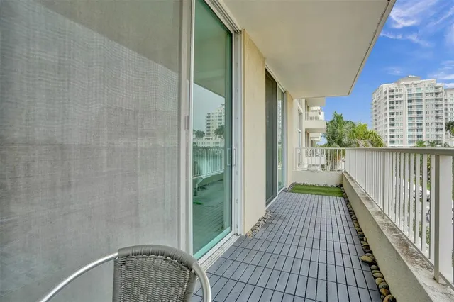a bedroom with a bed and a hallway