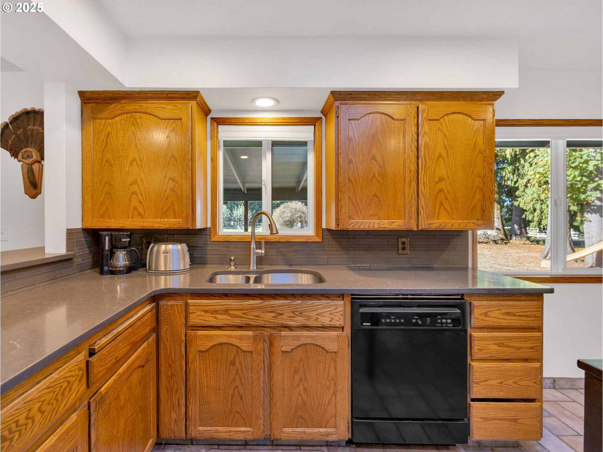 44434 Southeast Coalman Road Sandy, OR 97055 - Photo 28 of 48 a kitchen with a sink stove and cabinets
