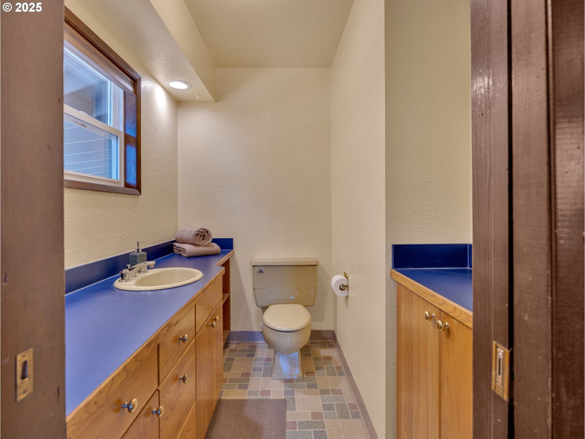 44434 Southeast Coalman Road Sandy, OR 97055 - Photo 31 of 48 a bathroom with a granite countertop sink and a mirror