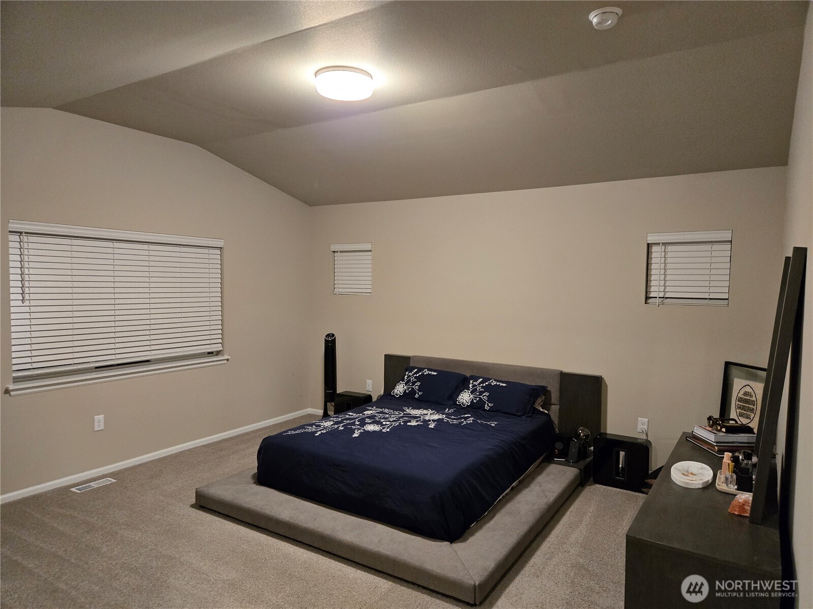 28902 239th Avenue Southeast Maple Valley, WA 98010 - Photo 16 of 22 a bedroom with a bed and a window