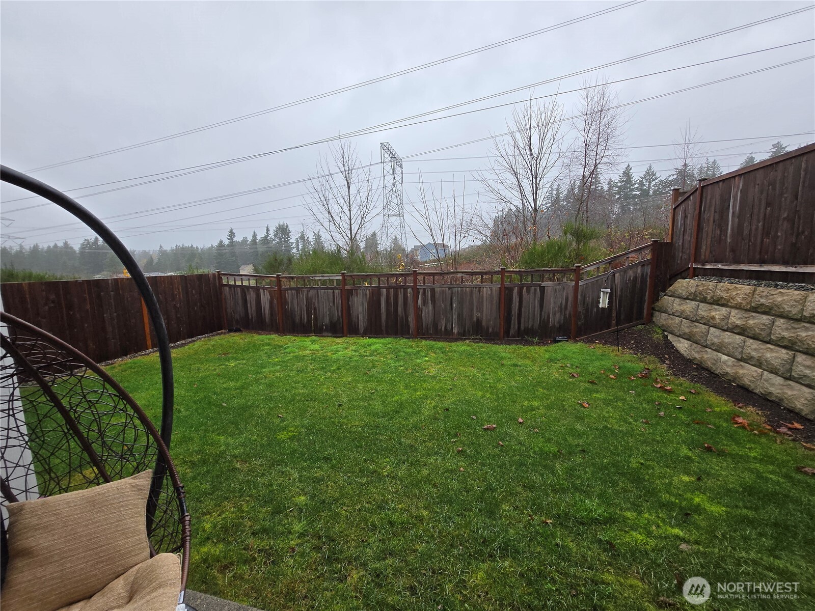 28902 239th Avenue Southeast Maple Valley, WA 98010 - Photo 18 of 22 a view of a backyard with a garden