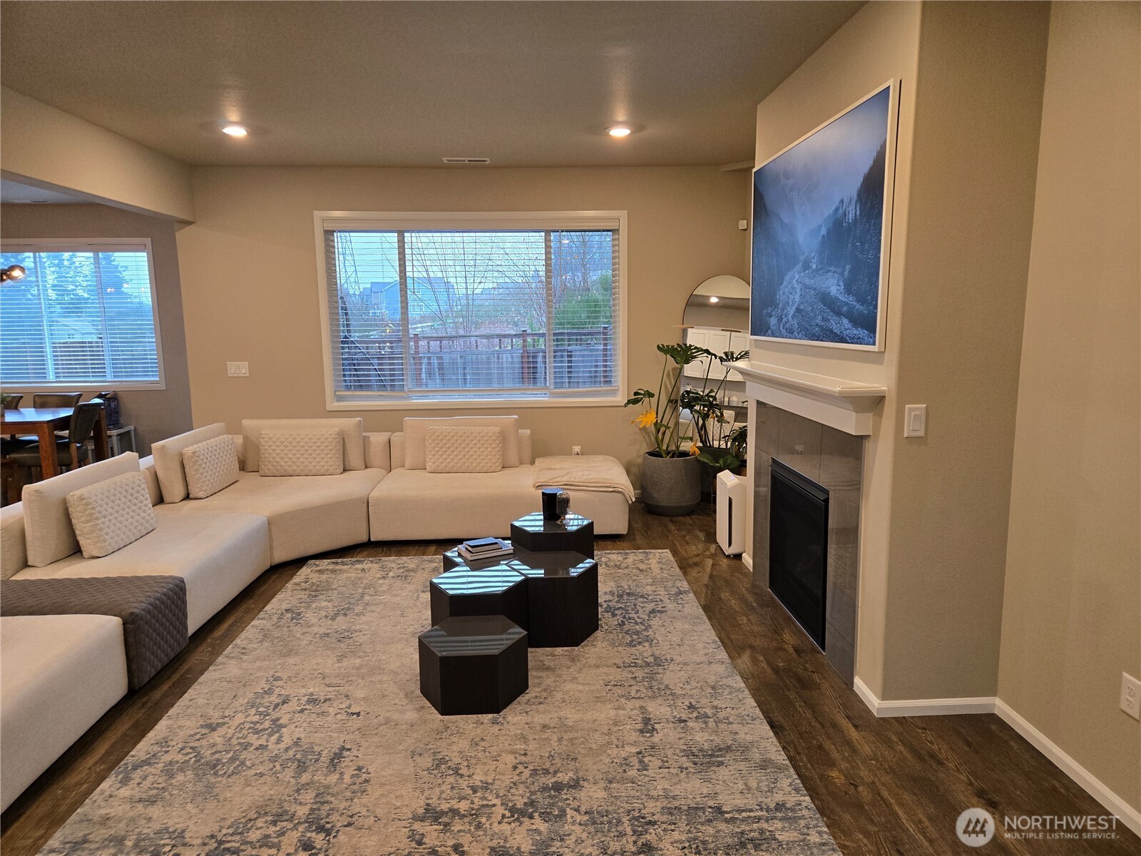 28902 239th Avenue Southeast Maple Valley, WA 98010 - Photo 4 of 22 a living room with furniture and a fireplace