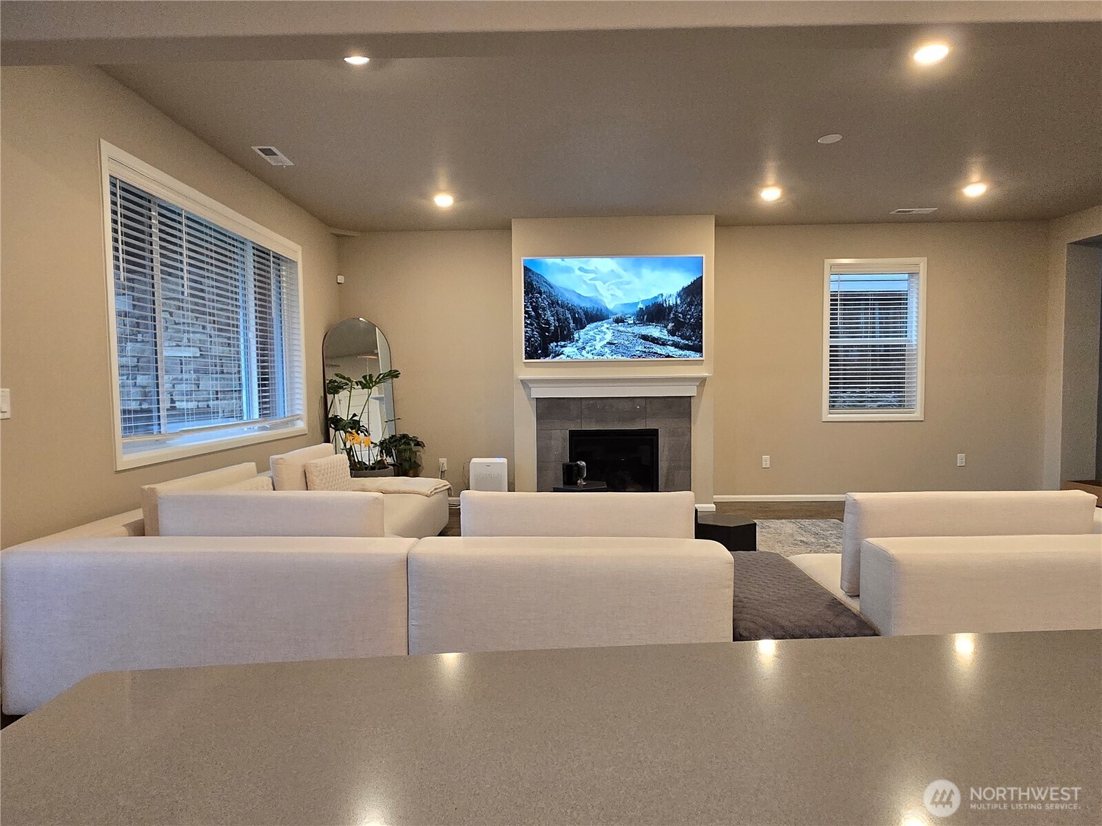 28902 239th Avenue Southeast Maple Valley, WA 98010 - Photo 5 of 22 a living room with furniture and a fireplace