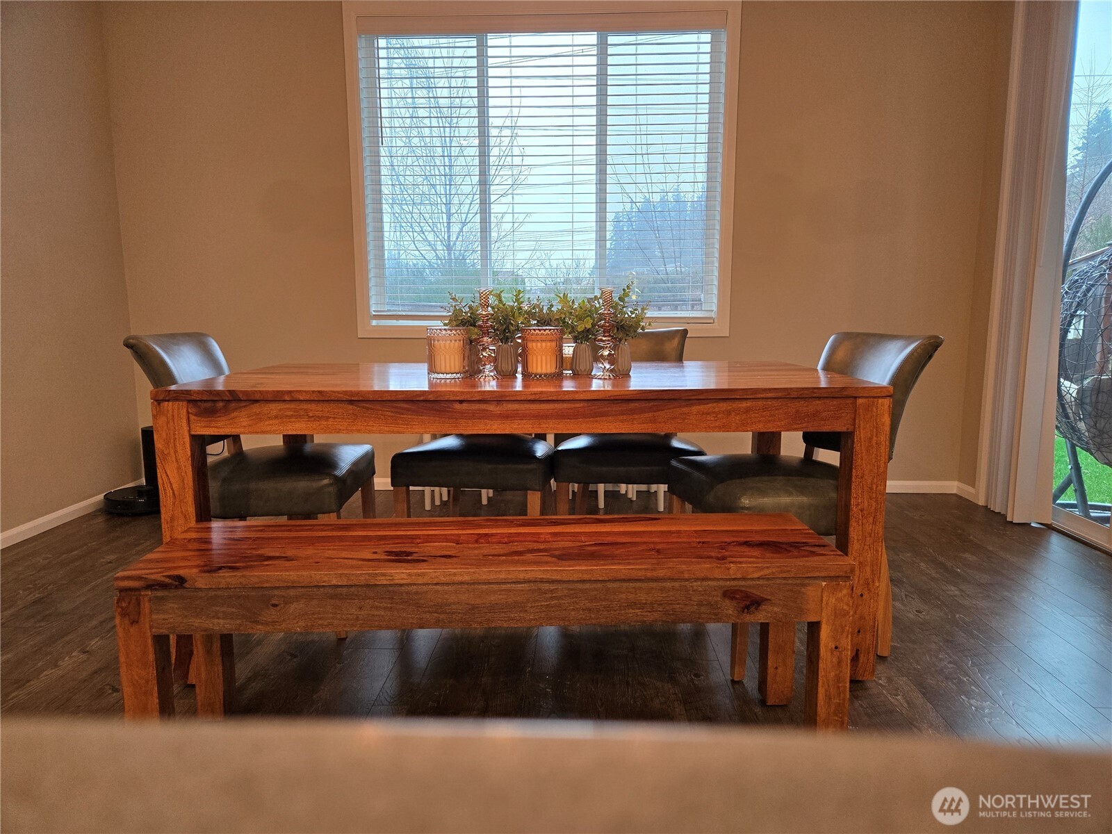 28902 239th Avenue Southeast Maple Valley, WA 98010 - Photo 6 of 22 a view of a dining room with furniture window and wooden floor