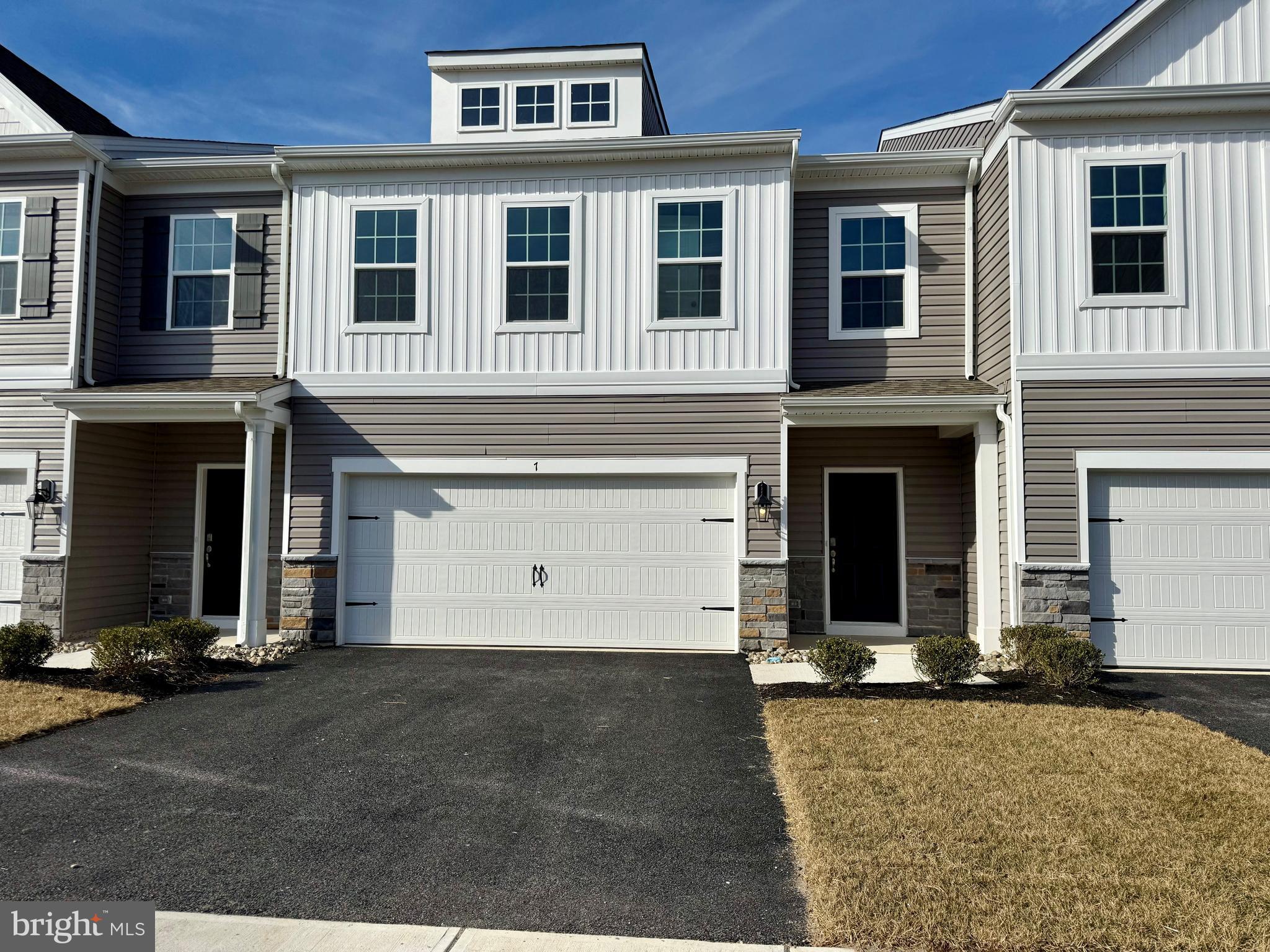 7 Dalton Way Rio Grande, NJ 08242 - Photo 1 of 52 a view of a brick house with many windows