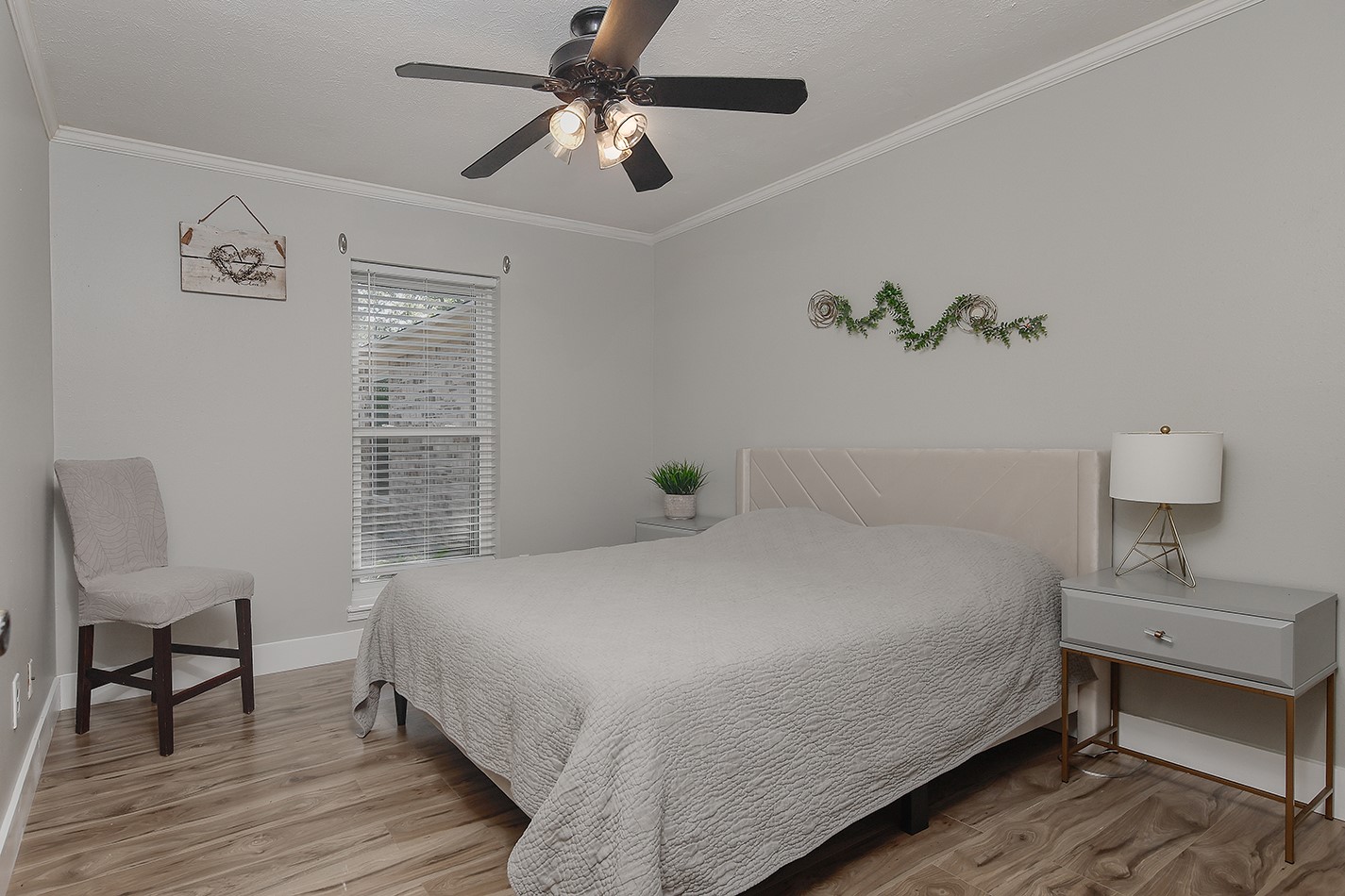 99 North Deerfoot Circle Spring, TX 77380 - Photo 14 of 22 a bedroom with a bed and a chair