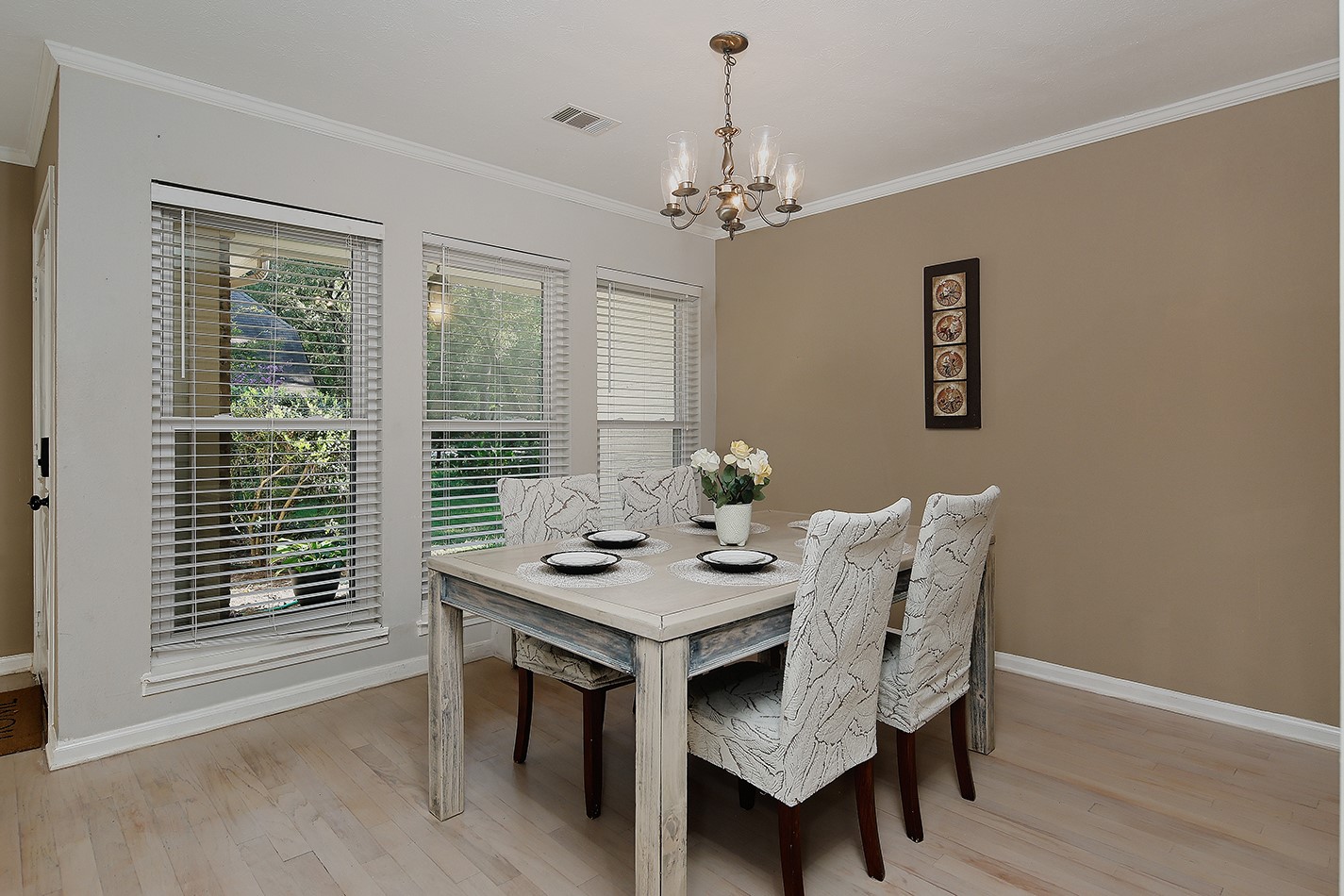 99 North Deerfoot Circle Spring, TX 77380 - Photo 4 of 22 a view of a dining room with furniture window and wooden floor