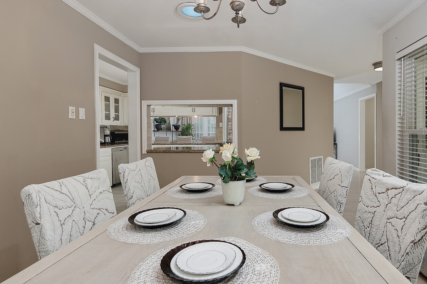 99 North Deerfoot Circle Spring, TX 77380 - Photo 5 of 22 a dining room with furniture and a wooden floor