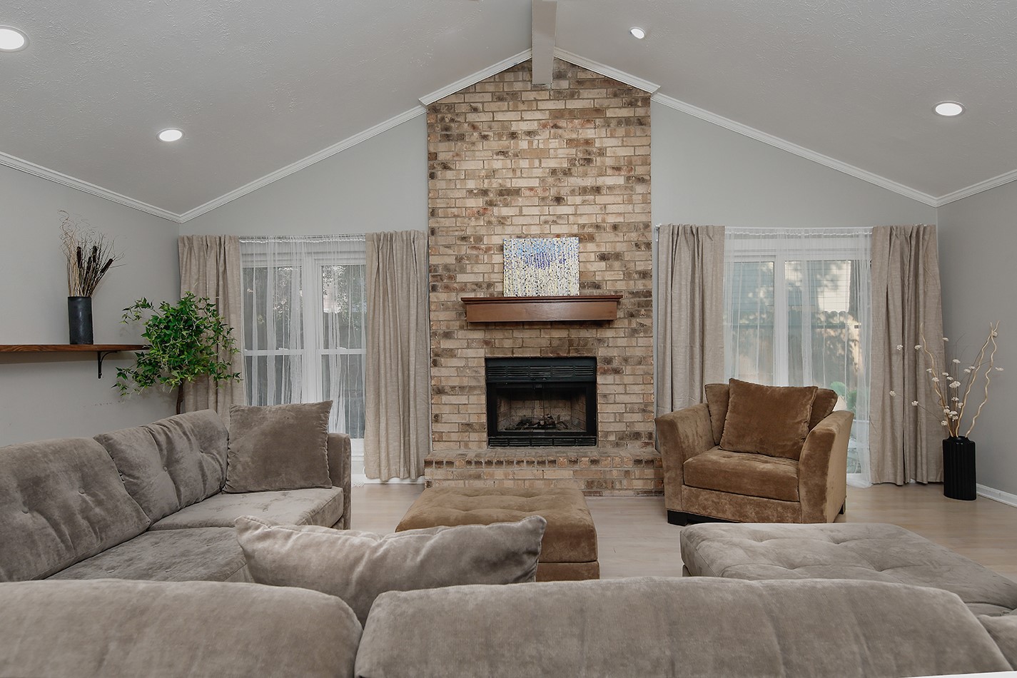 99 North Deerfoot Circle Spring, TX 77380 - Photo 7 of 22 a living room with furniture and a fireplace