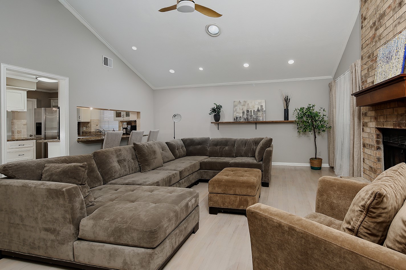 99 North Deerfoot Circle Spring, TX 77380 - Photo 9 of 22 a living room with furniture and a fireplace
