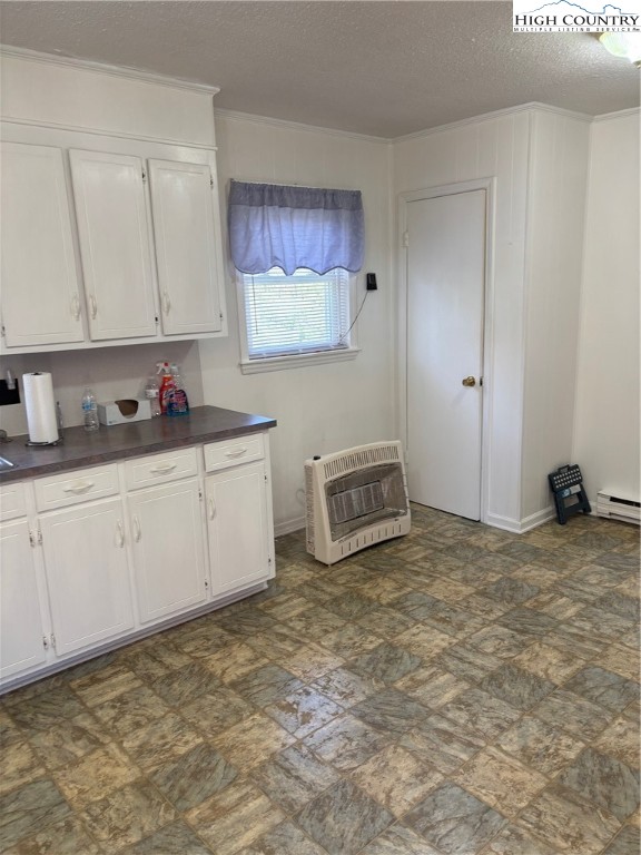 4182 Ridgeglen Road Sparta, NC 28675 - Photo 6 of 28 a kitchen with cabinets and a sink