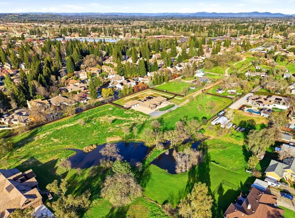 a view of a building with a big yard