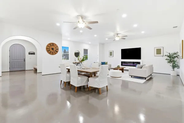 a bedroom with a bed and wall painting