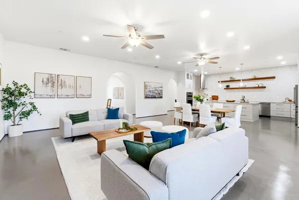 a living room with furniture and a window
