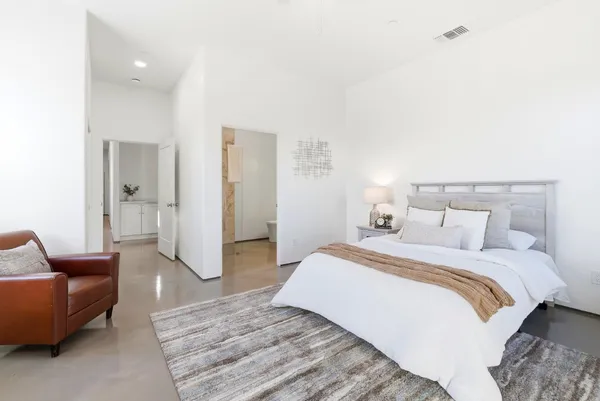 a living room with a couch and furniture